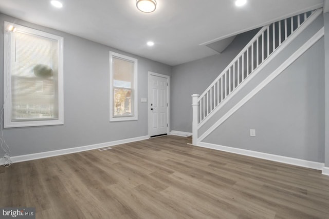 entrance foyer with hardwood / wood-style flooring