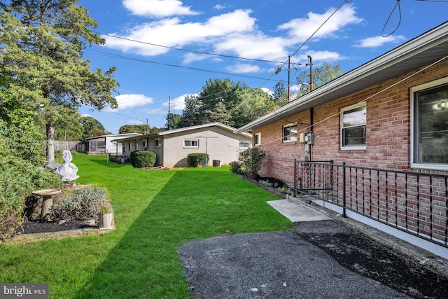 view of yard with central AC