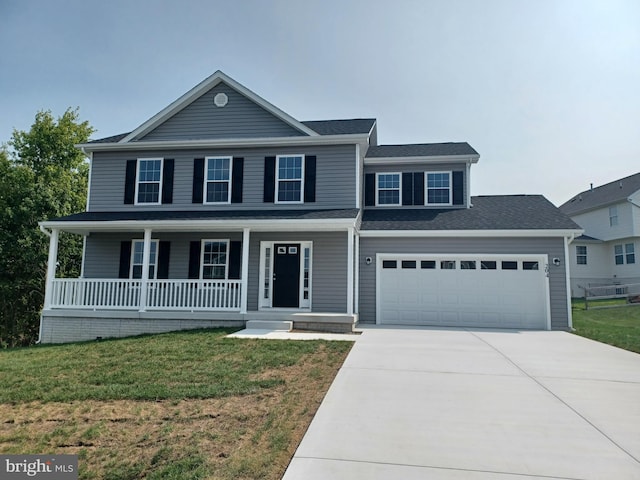 view of front of house with a porch and a front lawn