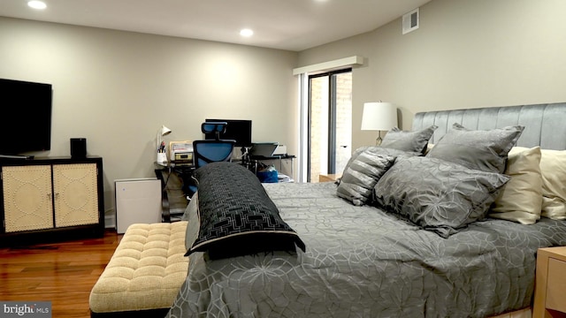 bedroom featuring dark wood-type flooring