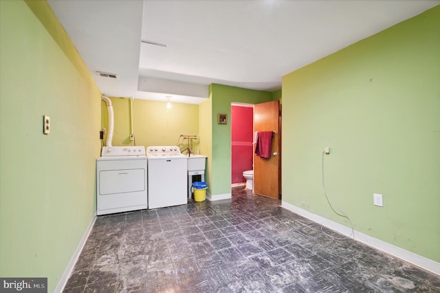 laundry area with independent washer and dryer