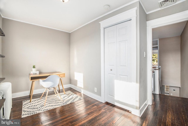 office area with dark hardwood / wood-style flooring and crown molding