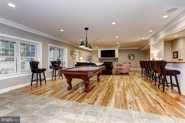 game room featuring light wood-type flooring, crown molding, and billiards