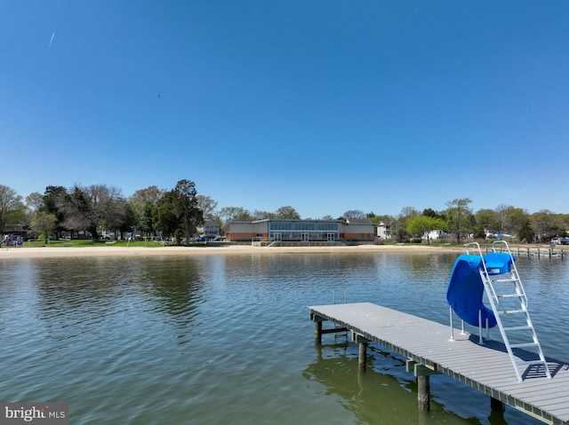 dock area featuring a water view