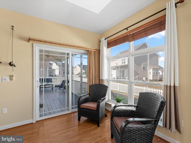 living area featuring hardwood / wood-style flooring