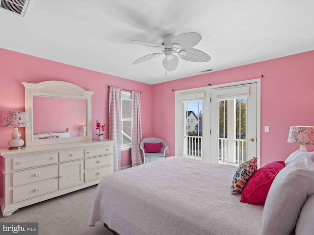 carpeted bedroom featuring ceiling fan and access to outside