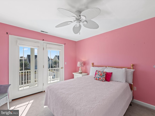 carpeted bedroom with ceiling fan and access to outside