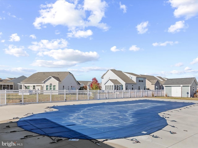 view of pool featuring an outdoor structure