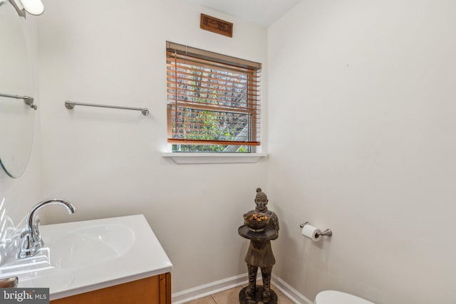 bathroom with vanity and tile patterned floors