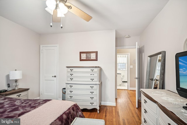 bedroom featuring light hardwood / wood-style floors and ceiling fan