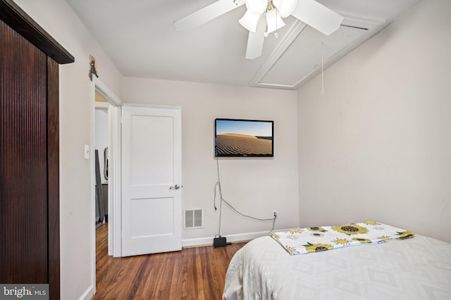 bedroom featuring ceiling fan and dark hardwood / wood-style flooring