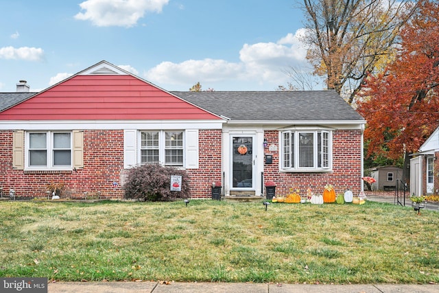 bungalow with a front lawn