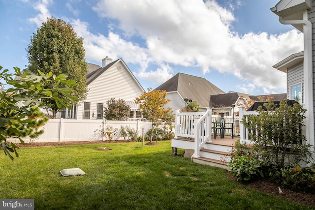 view of yard featuring a deck