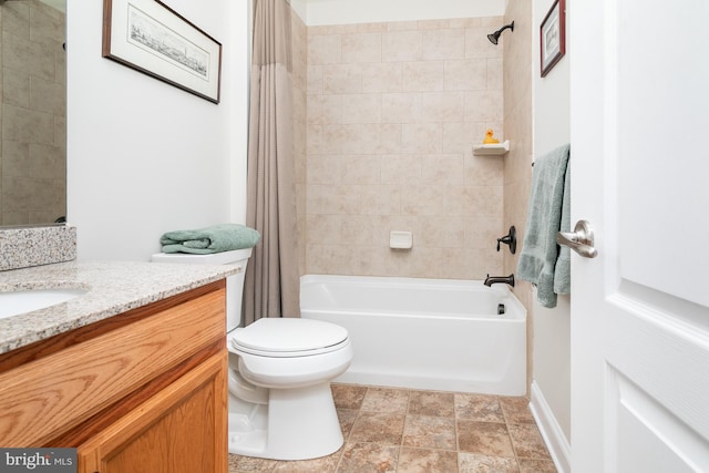 full bathroom featuring vanity, toilet, and shower / bath combo with shower curtain