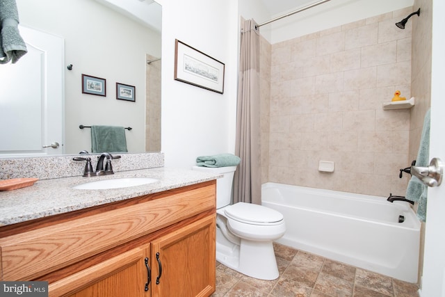 full bathroom with toilet, shower / tub combo with curtain, and vanity