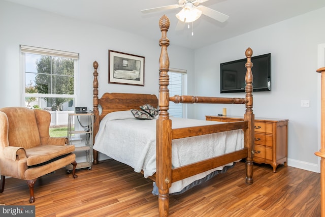 bedroom featuring wood-type flooring and ceiling fan