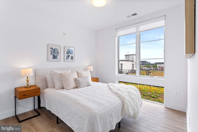 bedroom featuring hardwood / wood-style flooring