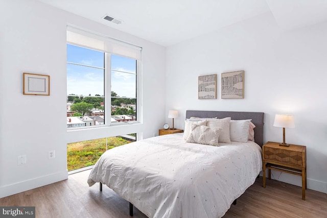 bedroom featuring hardwood / wood-style flooring