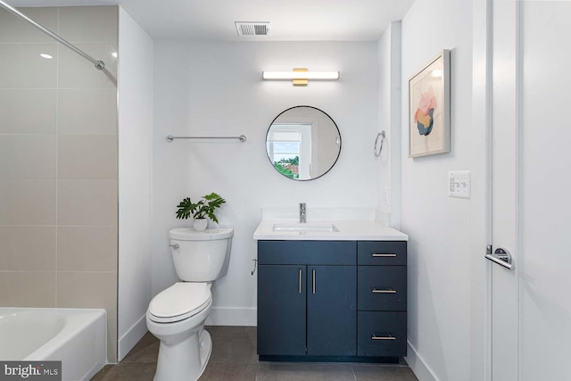 full bathroom with vanity, toilet, tiled shower / bath combo, and tile patterned floors