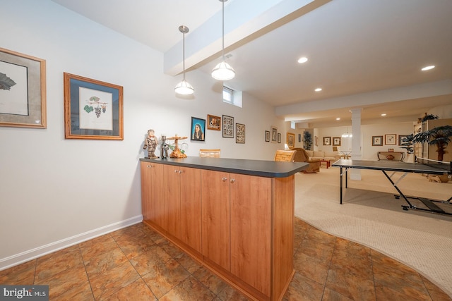 bar with beam ceiling, pendant lighting, and dark colored carpet