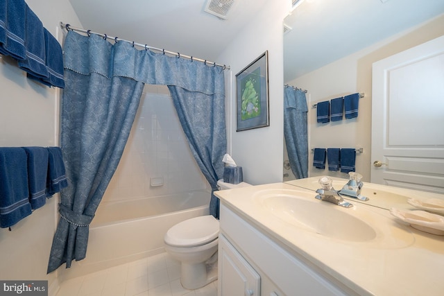 full bathroom with tile patterned floors, shower / bath combination with curtain, toilet, and vanity