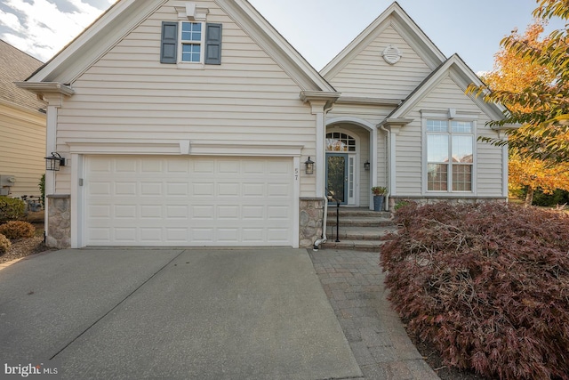 view of front of property with a garage