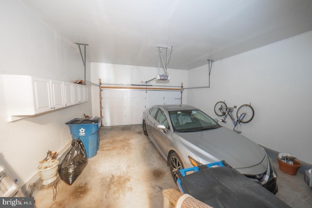 garage featuring a garage door opener