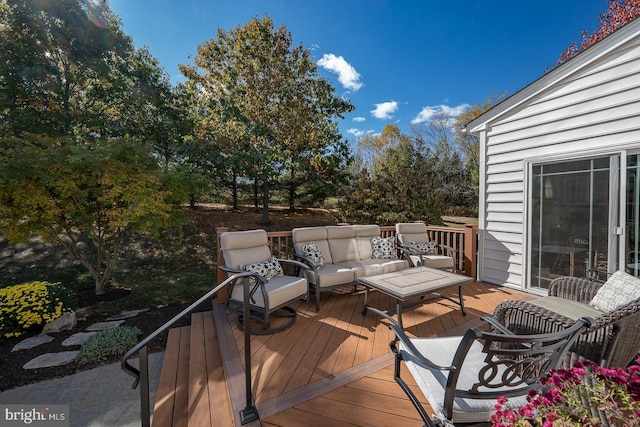 deck featuring an outdoor living space