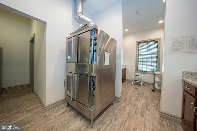 kitchen with light wood-type flooring