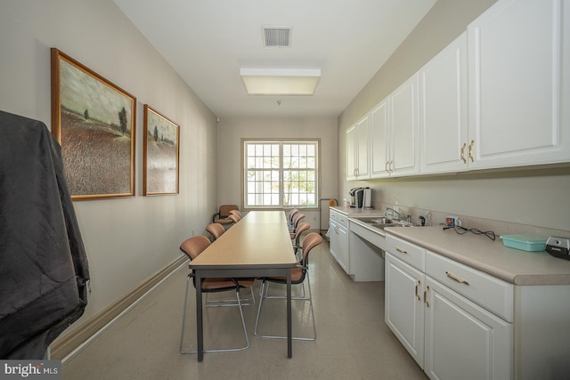 laundry area with sink