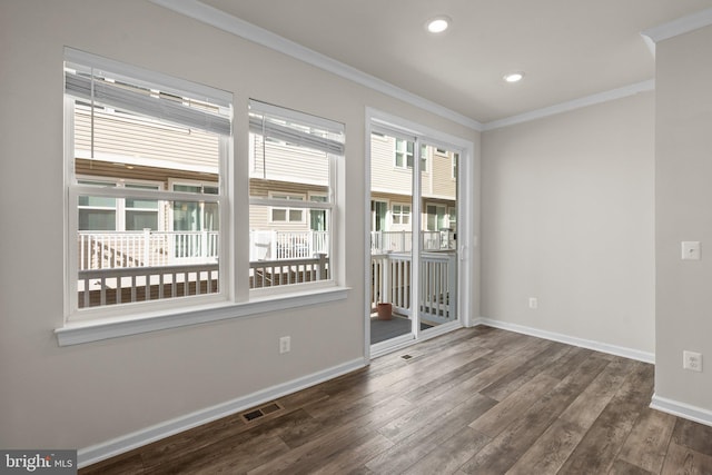 unfurnished room with crown molding and dark hardwood / wood-style floors