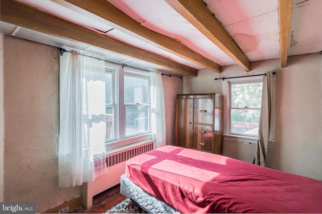 bedroom with beamed ceiling