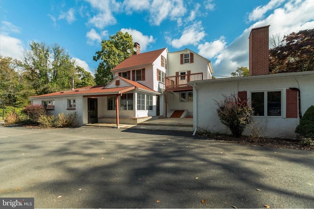 29 Boulder Rd, Upper Black Eddy, PA 18972 - back of property with a chimney and stucco siding