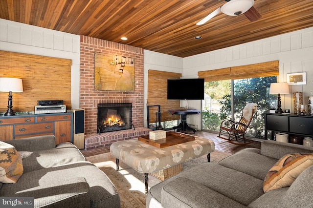 living room with a brick fireplace, wood-type flooring, wood ceiling, and wood walls