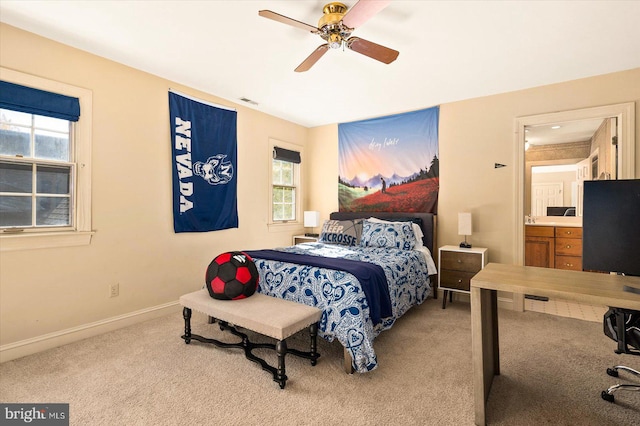 bedroom featuring ceiling fan and light colored carpet