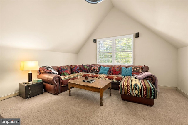 living room featuring carpet flooring and lofted ceiling