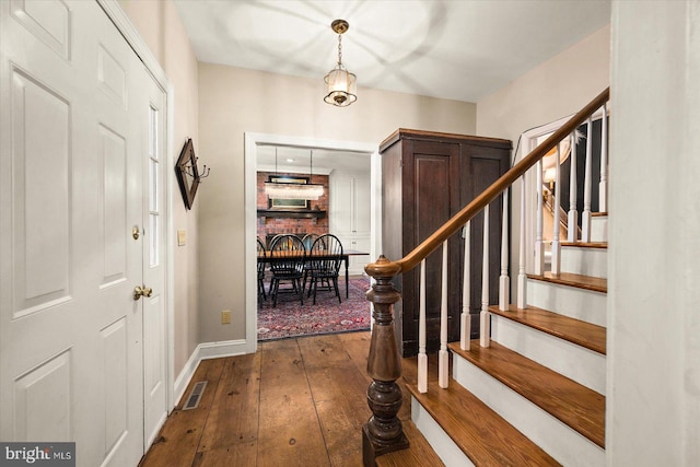 entrance foyer with wood-type flooring