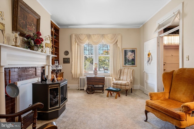 living area with radiator, built in shelves, ornamental molding, and carpet flooring