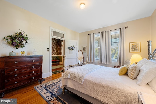 bedroom featuring wood-type flooring