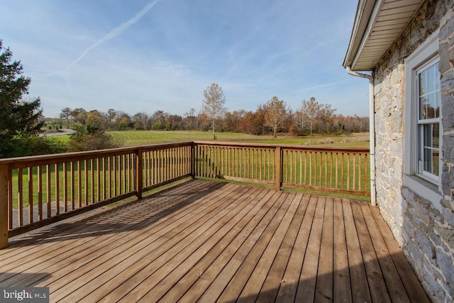 wooden deck with a yard