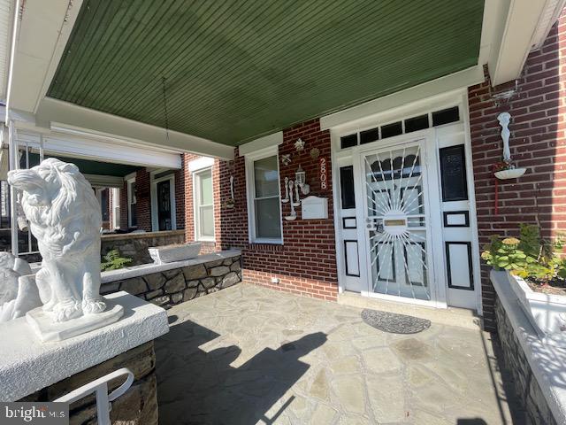 view of patio featuring a porch