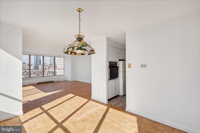 unfurnished dining area with parquet floors