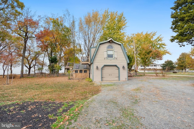 view of property exterior with a garage