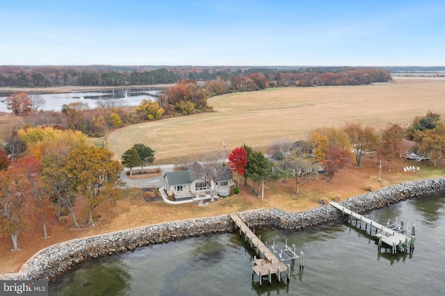 drone / aerial view featuring a rural view and a water view