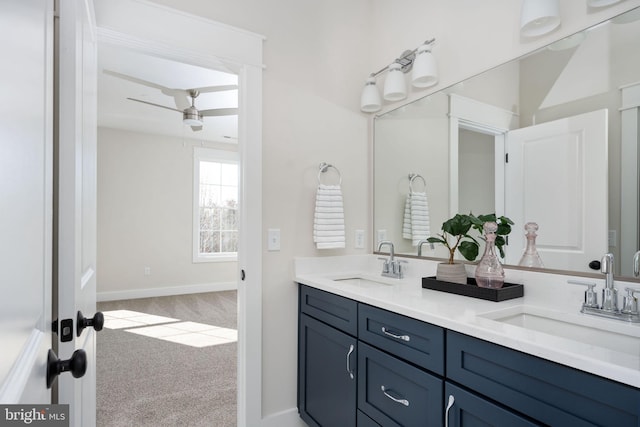 bathroom featuring ceiling fan and vanity