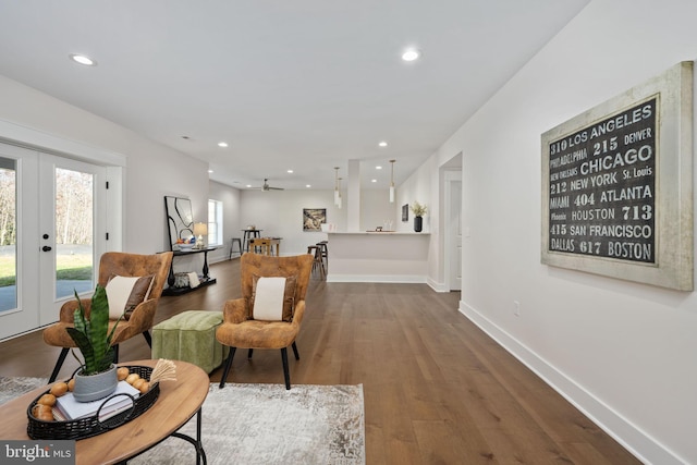 living room featuring hardwood / wood-style floors and french doors