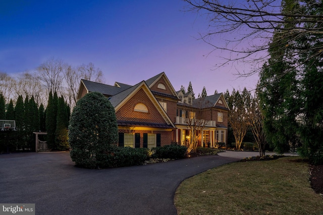 view of front of home with a yard