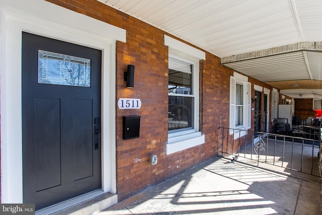 entrance to property with covered porch