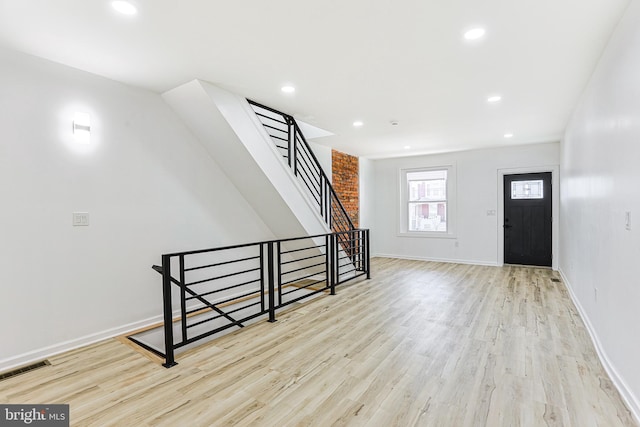 foyer featuring light hardwood / wood-style floors