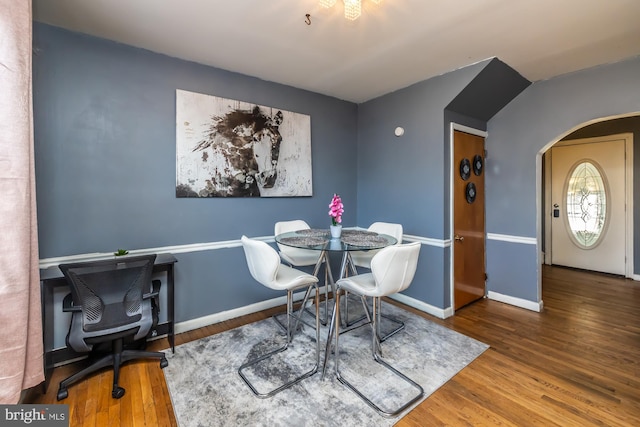 dining space featuring hardwood / wood-style floors